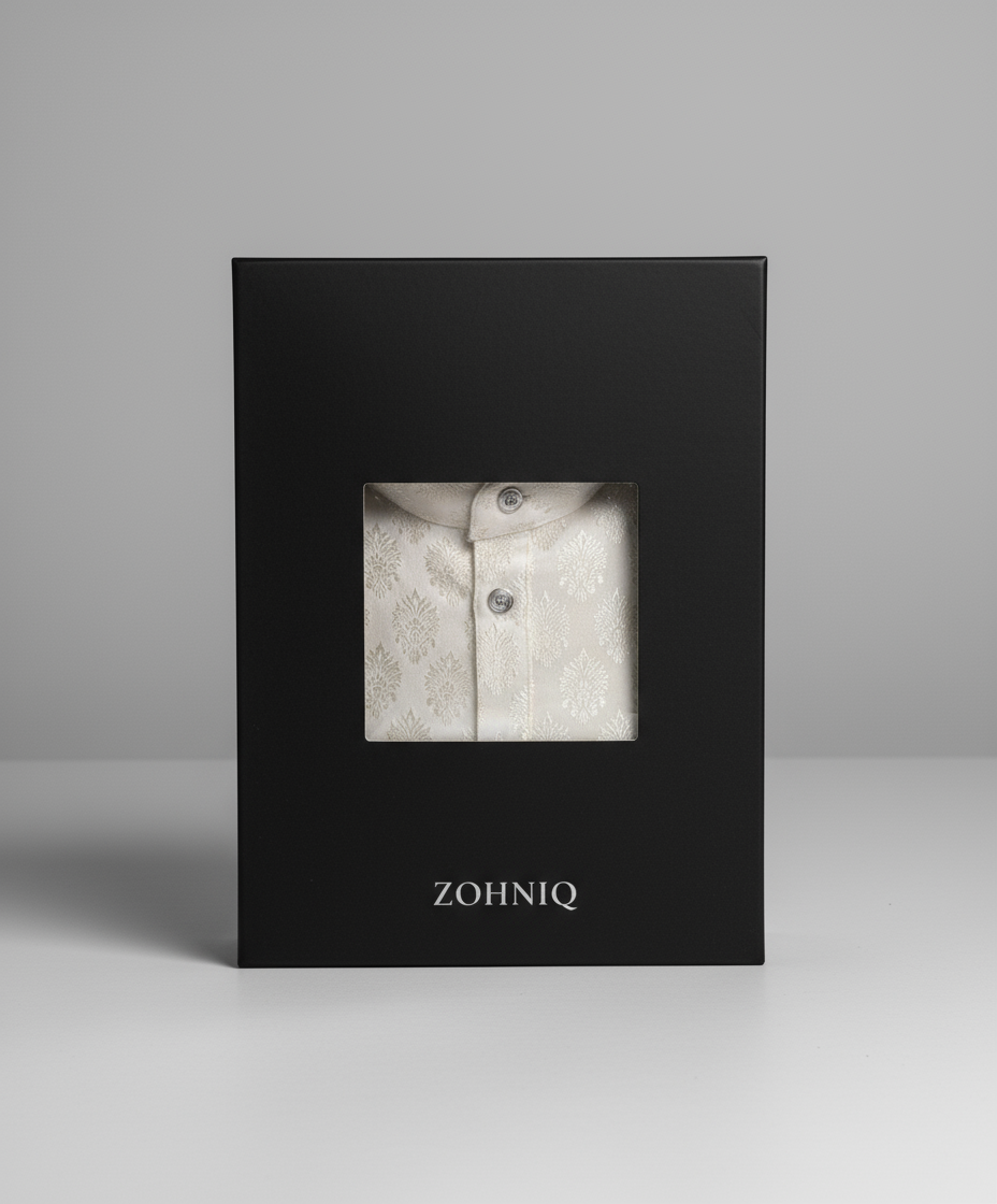 A white jacquard kurta with subtle pattern, featuring a mandarin collar and full sleeves.